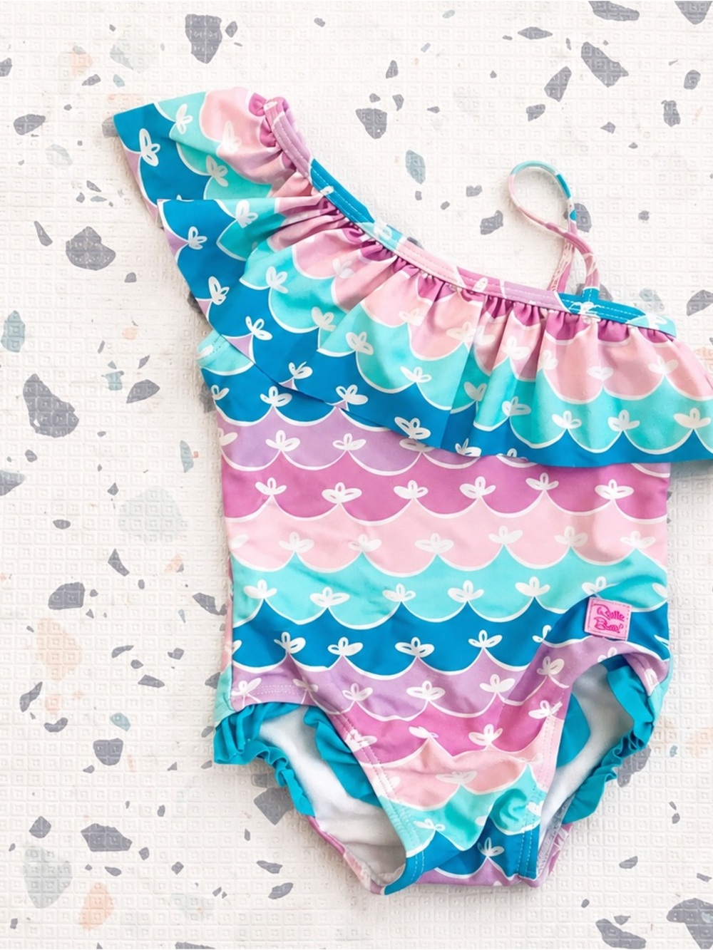 Ruffle Butts Pastel Mermaid Stripe One-Shoulder Swimsuit in Pink, Mint & Purple